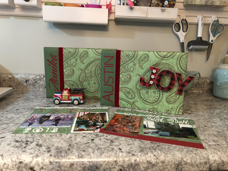 Two Christmas scrapbook covers.