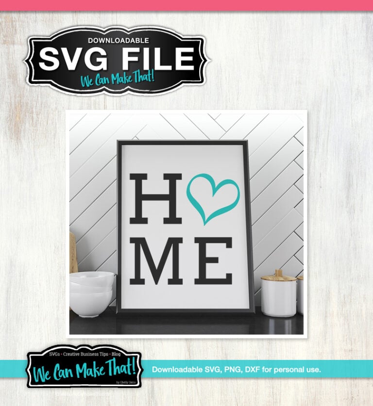 Black text saying "Home" with "O" replaced with a teal heart printed on a black-framed white canvas leaning against a wall.