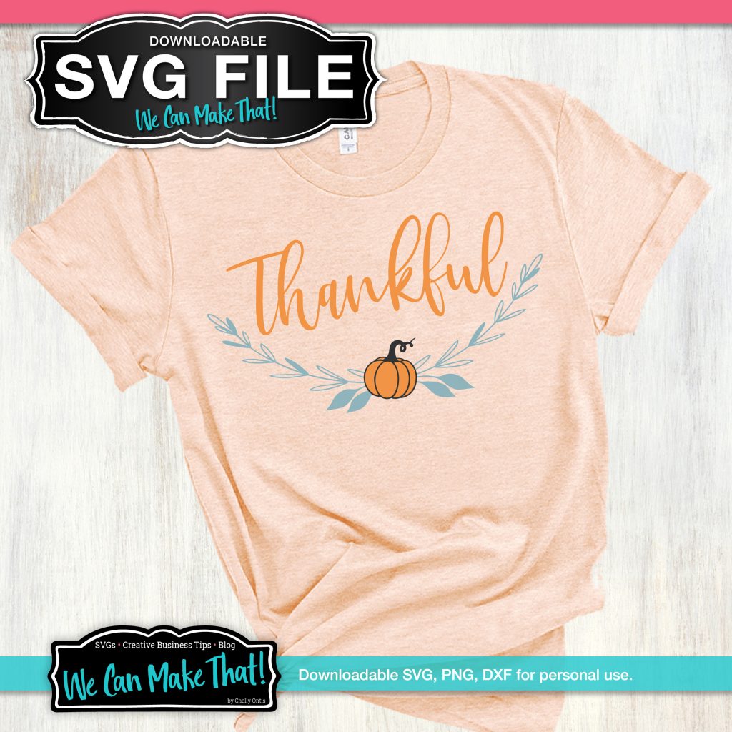 Design with a cursive text "Thankful" and pumpkin graphic printed on peach shirt.