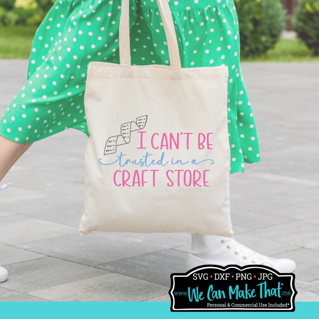 Tote bag with the "I Can't Be Trusted in a Craft Store" SVG design printed on it, carried by a woman in a green polka dot dress and white boots.