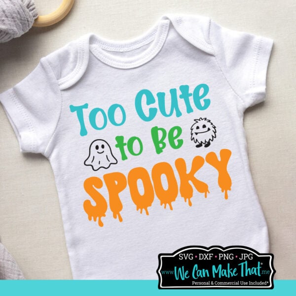 Baby onesie mockup with cute halloween saying in teal, green and orange.