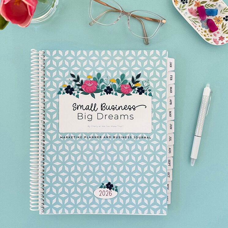 Planner on blue desktop with tulips.