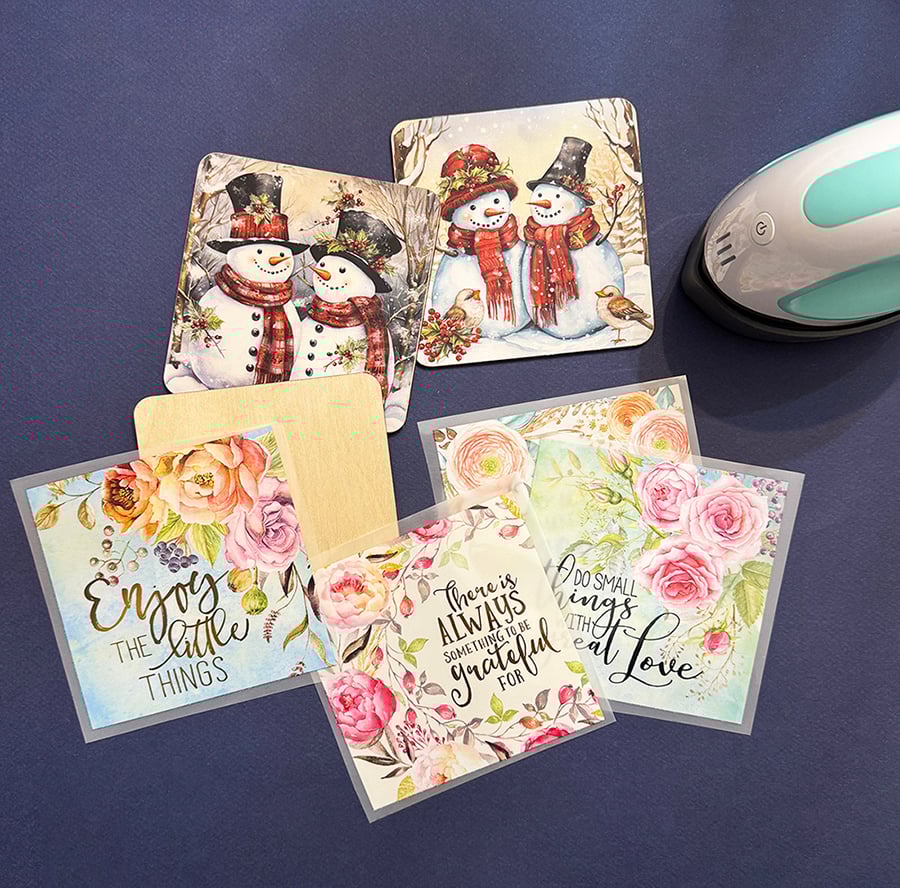 DTF transfer examples with wooden coasters and Cricut min press.